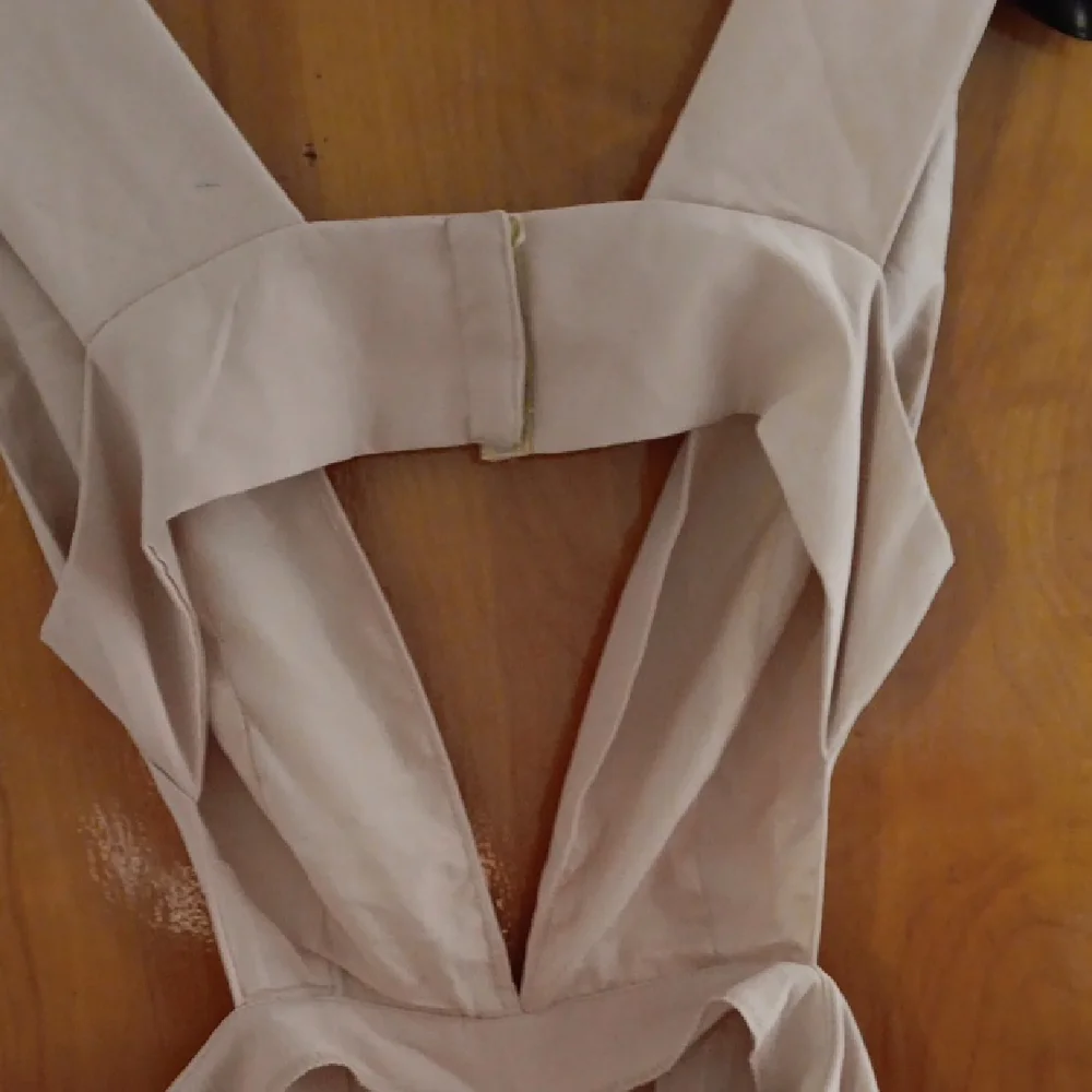 Lioness Chic Tan Jumpsuit with Wide Legs and Sleeveless Design - Picture 3 of 5